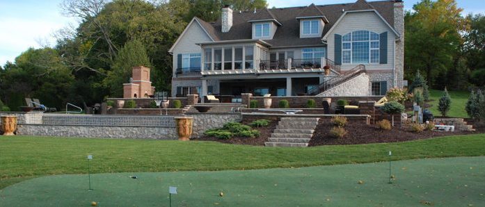 outdoor living with golf holes in backyard