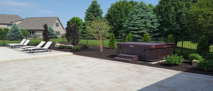 landscaping around hot tub and patio
