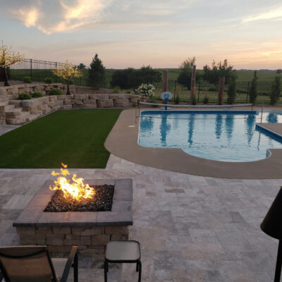 Use artificial turf for beauty and safety next to your pool.