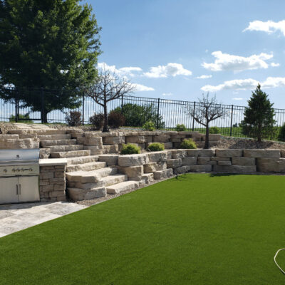 Accent any backyard living space using artificial turf.