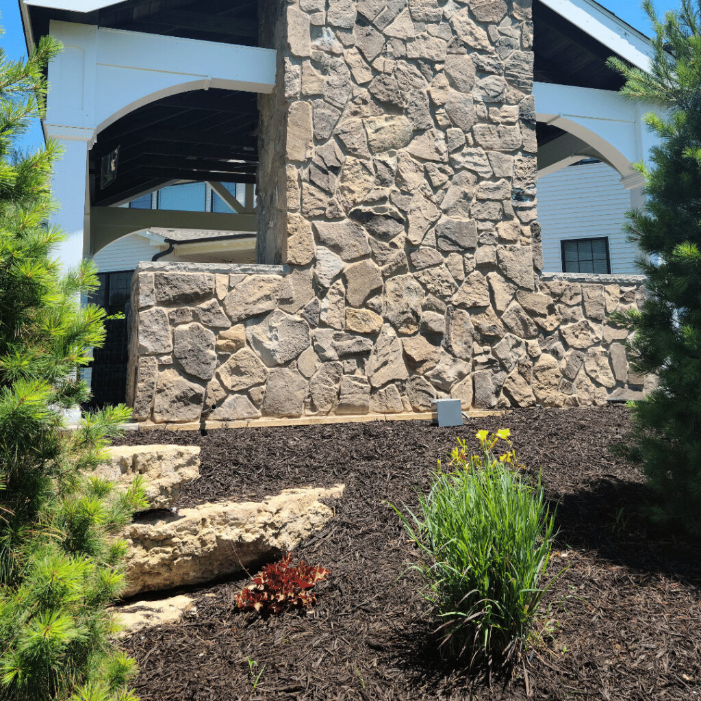 Achieve privacy with landscaping add ons such as stone walls and evergreen trees. 