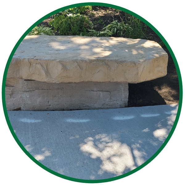 This great natural stone bench ads a nice seating area to the Ability Garden. 
