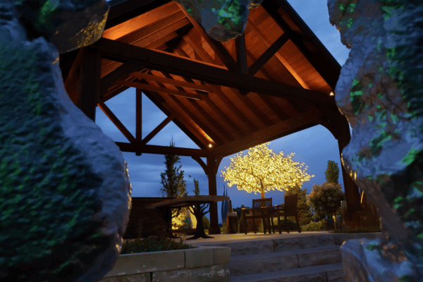 Pavilion at Outdoor Innovations with landscape lighting elements.