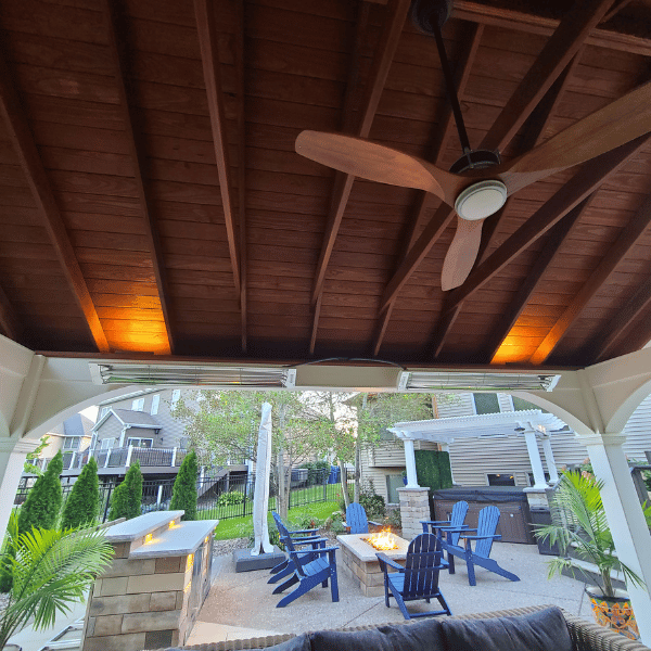 Image showing the inside of a Country Lane pavilion from Outdoor Innovations with both heaters and a fan. 