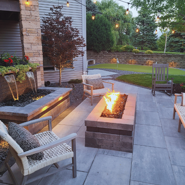 Image of a custom fire feature in Bettendorf in a residential backyard.